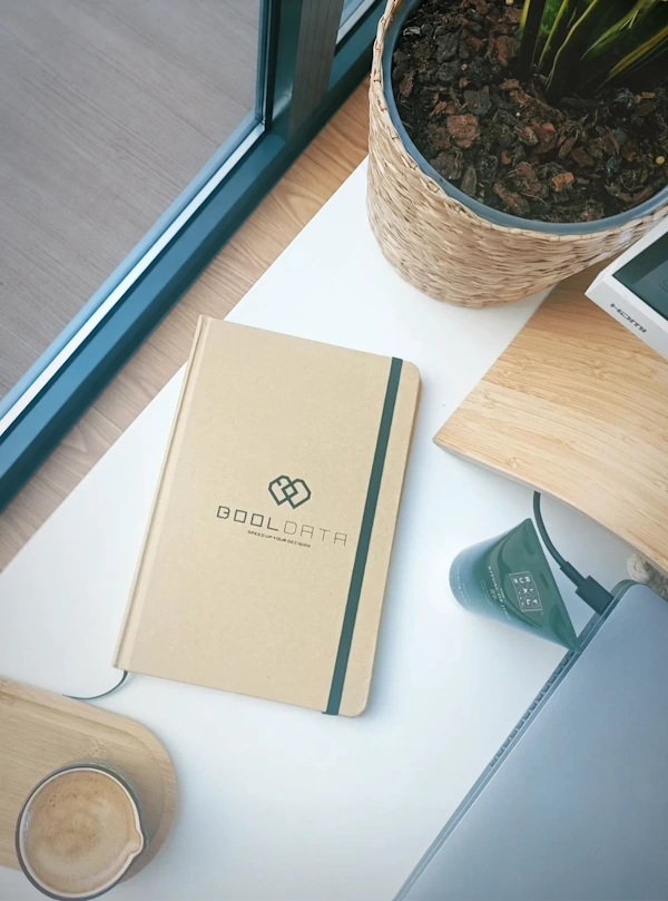 Open booldata-branded notebook on a desk